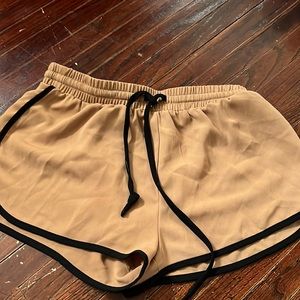 Brown and black shorts